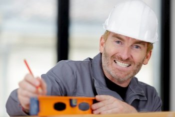 happy smiling contractor looking at camera
