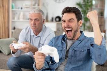 happy family playing video games at home