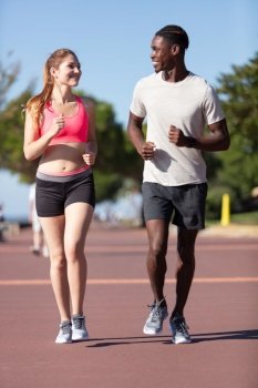 fitness couple is jogging outside