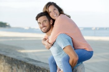 portrait of a couple enjoying the beach