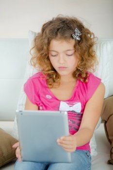Young girl using computer tablet