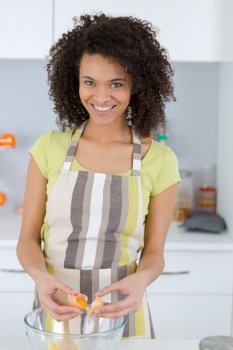 happy woman baking in her kitchen