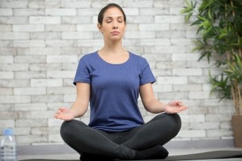young attractive woman practicing yoga