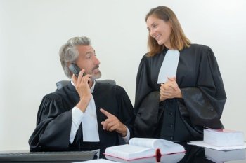 Two judges, one on telephone