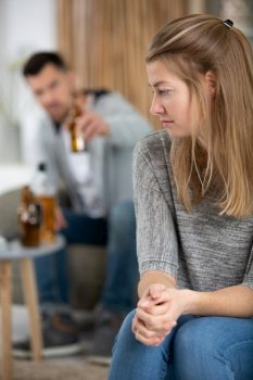 emotional angry young woman with alcoholic husband