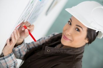 attractive woman builder smiling at camera
