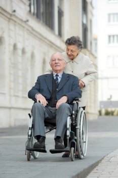 elderly couple going for a stroll