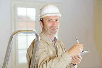 male builder looking at camera