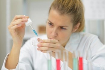 woman scientist doing research in laboratory
