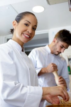 a female industrial chef at work