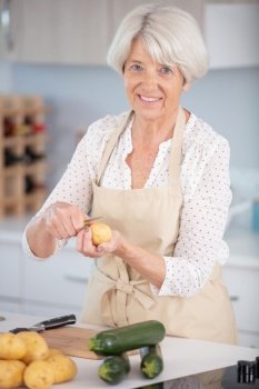 senior woman preparing healthy food