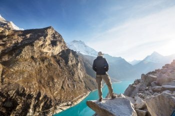 Hiker admires the lake  Paron in Cordillera Blanca,  Peru, South America