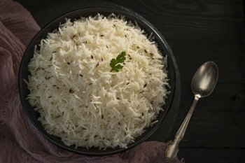 Steamed rice with Zeera  in a balck bowl