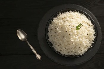 Steamed rice with Zeera  in a balck bowl