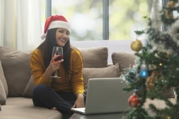 Happy Woman Making Video Call During Christmas Celebration