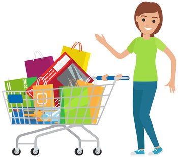 Happy woman with shopping cart. Purchases, goods, gift packages in trolley. Female character enjoying lot of purchases. Shopping, buying goods in store concept. Smiling girl near cart with goods. Happy woman with shopping cart. Female character enjoying purchases, goods, gift packages in trolley
