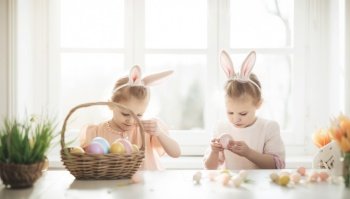 The photo features a vibrant and colorful Easter-themed image, with various symbols of the holiday. The bright and cheerful colors evoke a festive and joyous atmosphere, capturing the spirit of the springtime celebration. Overall, the photo exudes a sense of happiness and excitement that is synonymous with the Easter holiday.. AI generative illustration
