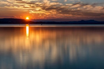 Play of colors at Lake Constance with a beautiful cloud mood Sunset summer