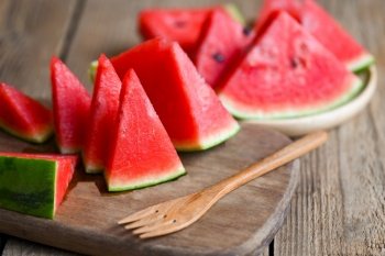 Watermelon slice on wooden background, Closeup sweet watermelon slices pieces fresh watermelon tropical summer fruit