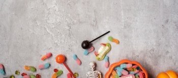 Happy Halloween day with ghost candies, pumpkin,  bowl and decorative. Trick or Threat, Hello October, fall autumn, Festive, party and holiday concept