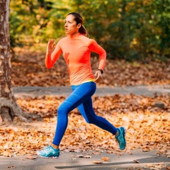 Woman Jogging. Nature, Outdoor Park. Woman Jogging Outdoors in Park