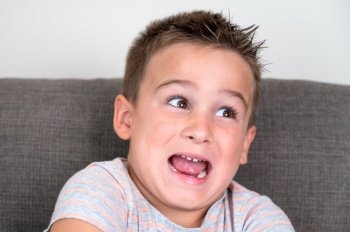 Portrait of a funny Male Child Making Faces. High quality photo. Portrait of a funny Male Child Making Faces.