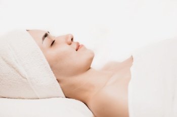 Asian women sleeping relax for beauty facial health skin care and hair treatment in spa salon.