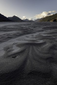 Delicate patterns of rock silt line the the Dart River in Glenorchy, known famously for the filming location of Isengard in the Lord of the Rings movies.
