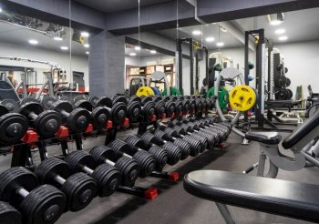 The dumbbells in the sports complex. Dumbbells in the sports complex