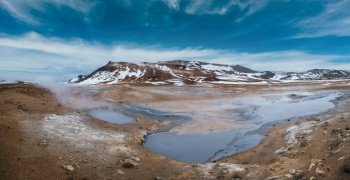 The Namafjall Geothermal Area, Iceland, on the east side of Lake Myvatn. At this area, also known as Hverir, are many smoking fumaroles, boiling mud pots and sulphur crystals.