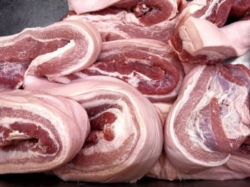 Raw pork meat pile in market