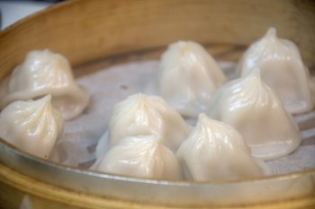 Steamed pork soup dumplings named Xiao long bao in Taiwan, Taiwanese famous gourmet.