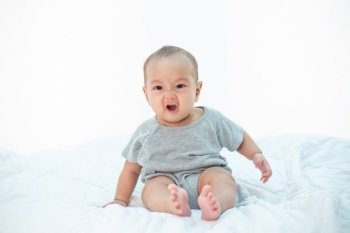 angry baby with white background