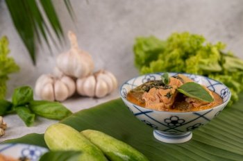 Chicken curry with Wax gourd in a ceramic cup, Selective focus.