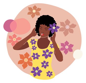 Young woman with dark skin and curly hair wearing t-shirt with clematis flowers illustration.