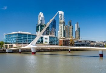 Footbridge and modern offices and apartments in Puerto Madero district of Buenos Aires. Modern development in the Puerto Madero district of Buenos Aires
