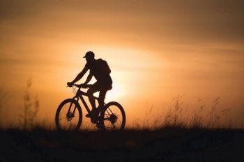 Cyclist in sunset. Illustration Generative AI
