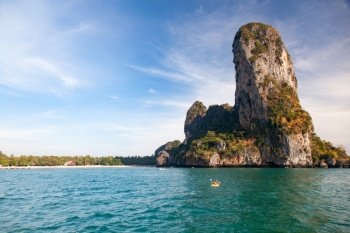 beautiful tropical beach in Thailand with longtail boats
