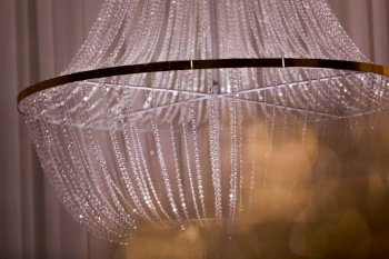 wedding decor beautiful crystal chandelier close up.. wedding decor beautiful crystal chandelier close up