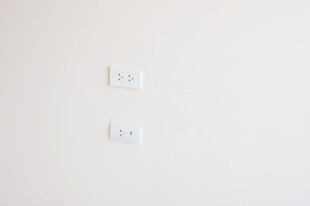 Electrical socket on wall at  home or apartment