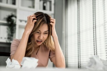 A competent female employee who has become completely exhausted as a result of overburdened work. Concept of unhealthy life as an office worker, office syndrome.. A competent female employee who has become completely exhausted from overwork.