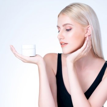 Closeup personable beautiful perfect natural cosmetic makeup skin woman holding mockup jar moisturizer cream for healthy skincare treatment, anti-aging product advertisement in isolated background.. Closeup personable perfect skin woman holding mockup moisturizer jar.