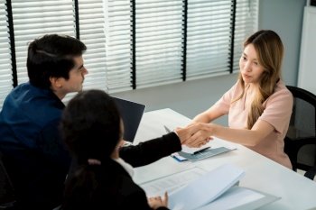 A new and competent female employee successfully interviewed. Newly graduated gets her first job after the interview.. A new and competent female employee successfully interviewed.