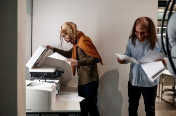 Zombies at copier in the office. Exhausted workers copying paper documents using printer-scanner. Zombies at copier in the office