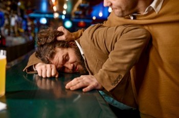 Soccer fans fight. Aggressive man pulling guy on bar counter. Friends conflict in pub. Furious people. Aggressive man pulling guy on bar counter