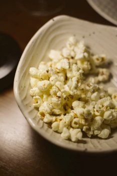 Close Up Of Popcorn In Bowl On Table
. Close Up Of Popcor