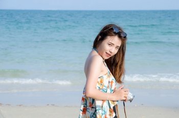 asian women portrait with smile face on beach