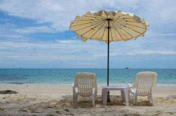 two chair with umbrella on beach
