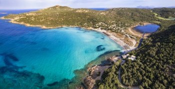 Sardegna (Sardinia) island aerial drone view of best beaches. Grande Pevero beach near Porto Cervo in emerald coast (Costa Smeralda), Italy
