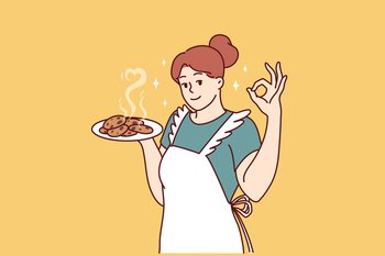 Smiling housewife in kitchen apron preparing homemade cookies to invite family for breakfast. Positive housewife learns how to cook desserts and pastries, wanting to surprise husband and children . Smiling housewife in kitchen apron preparing homemade cookies to invite family for breakfast